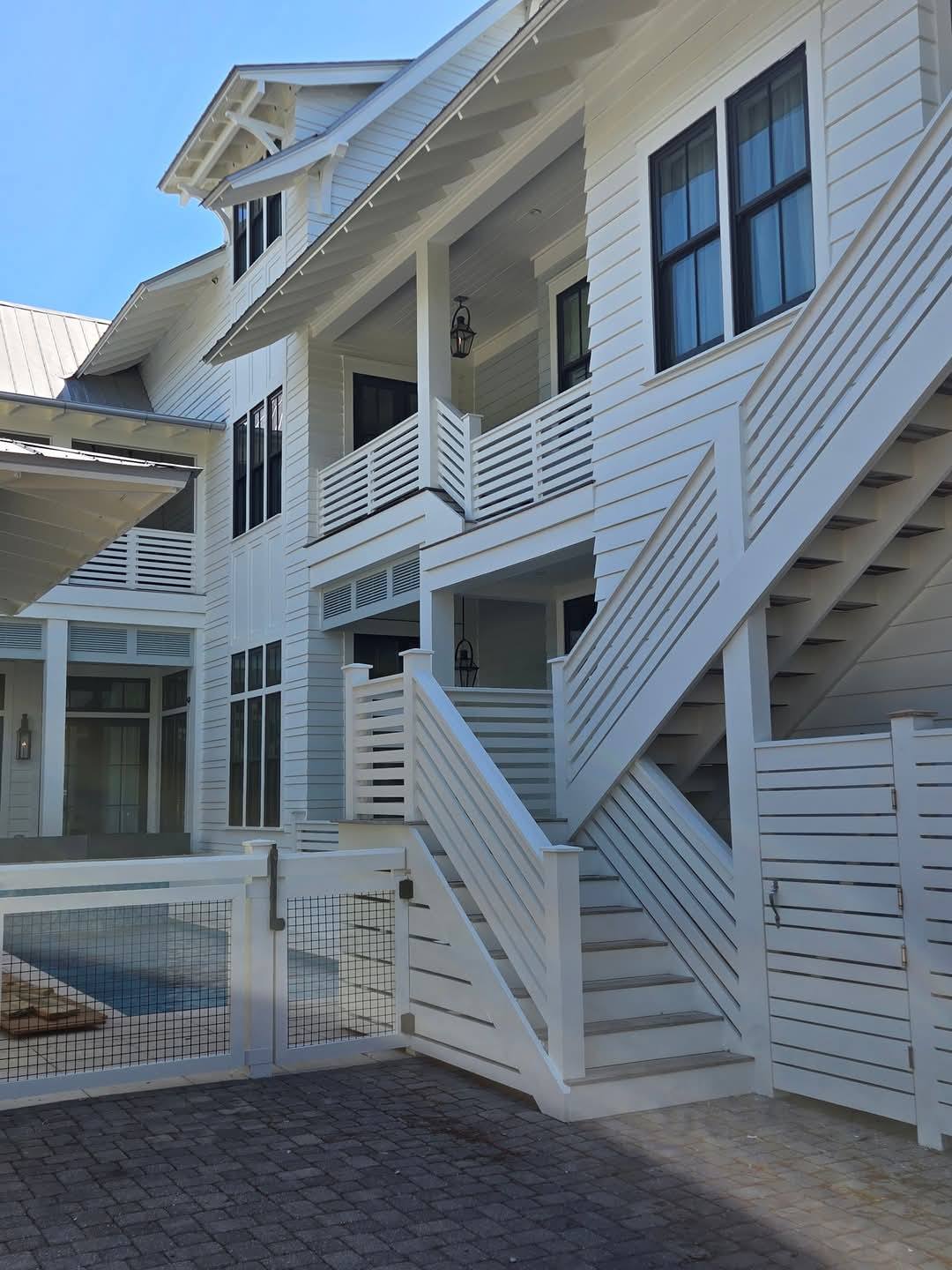 Coastal exterior stairs and railing on a 30A home build in Rosemary Beach Florida