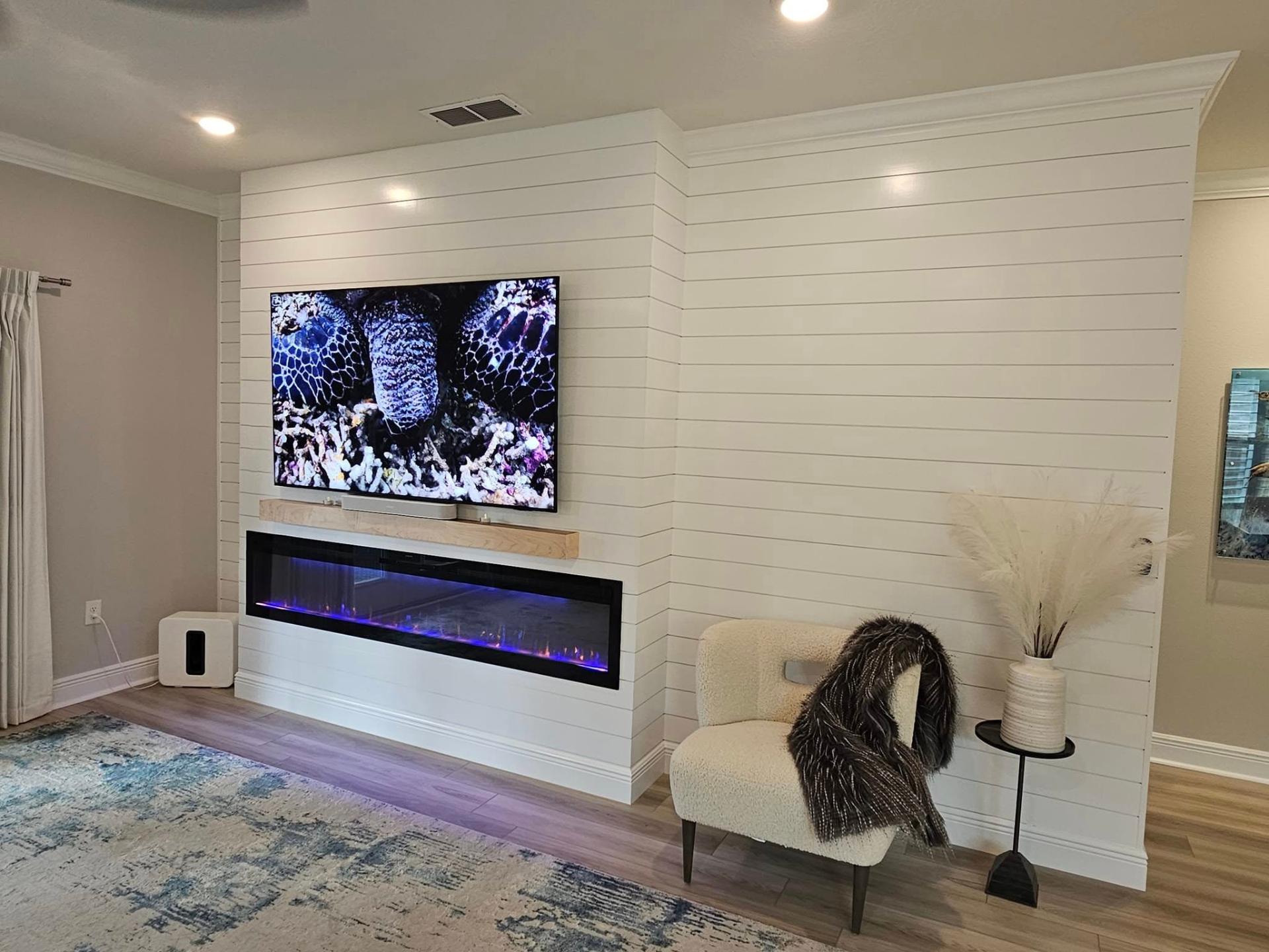 Interior fireplace remodel by Essential Construction, home remodeling contractor in Destin Florida
